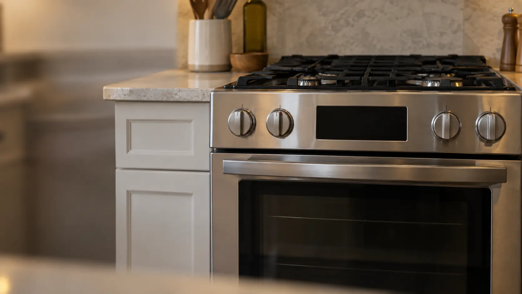 The small display panel of a stove seen close and square on above the oven door.